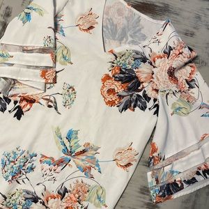 Floral top with bell sleeves